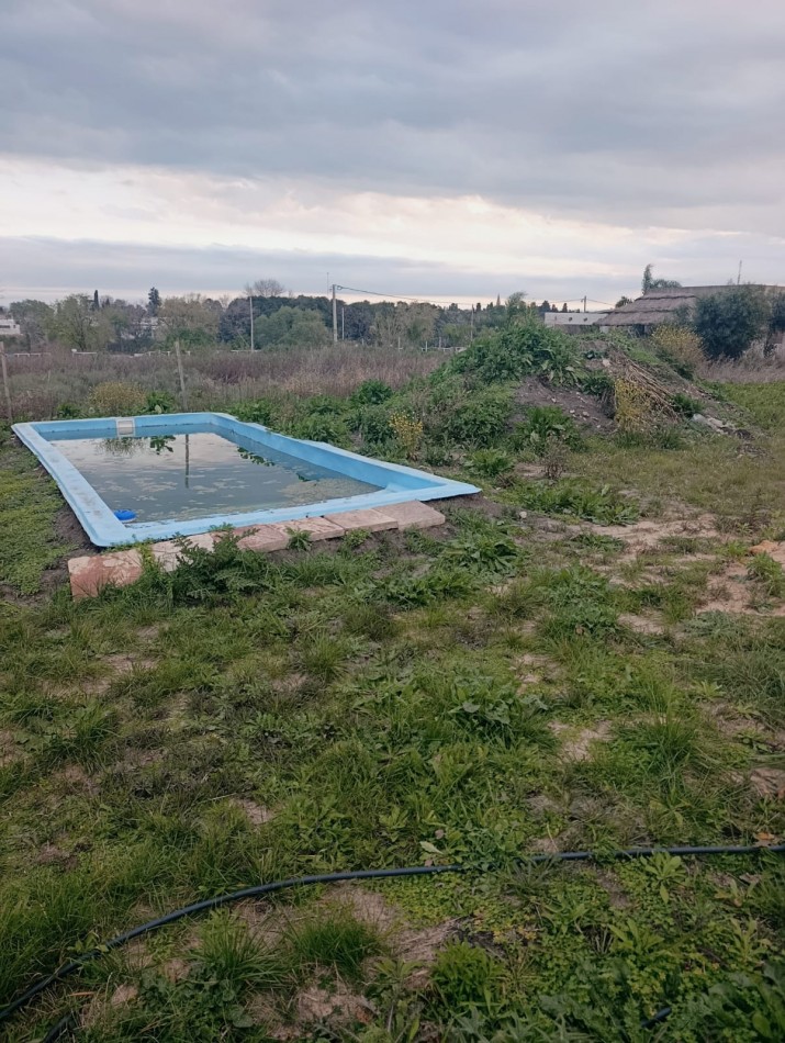 En venta terreno con quincho a terminar y pileta Oportunidad se viene el veranito